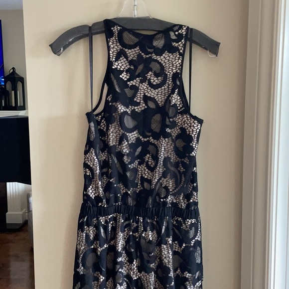 DVF SHANY BLACK LACE JUMPSUIT 6. Bought on Poshmark but it sadly does not fit. - Picture 12 of 12